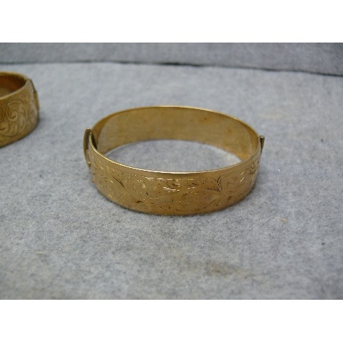 33 - 2 GOLD PLATED BANGLE BRACELETS & A NAPKIN RING