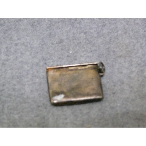 29 - A SILVER STAMP HOLDER FOB