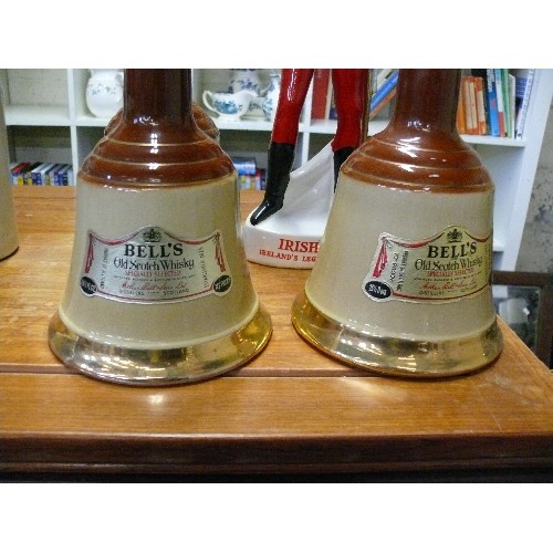 235 - AN IRISH MIST IRELAND'S LEGENDARY LIQUEUR SOLDIER DECANTER PLUS 3 BELLS WHISKY DECANTERS