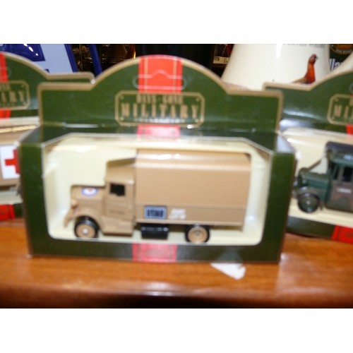 226 - 3 BOXED 'DAYS GONE MILITARY' VEHICLES MORRIS LIGHT TRUCK, 1934 MACK CANVAS BACK TRUCK AND A 1932 DEN... 