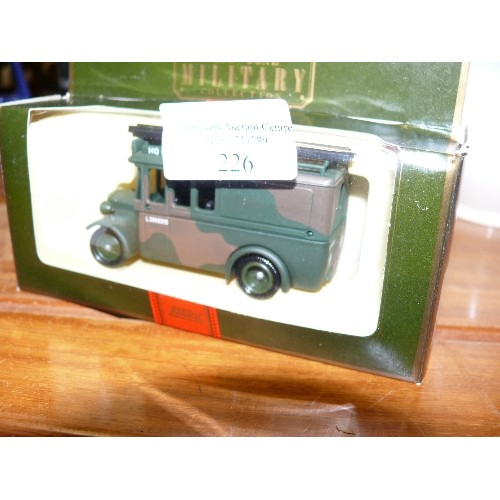 226 - 3 BOXED 'DAYS GONE MILITARY' VEHICLES MORRIS LIGHT TRUCK, 1934 MACK CANVAS BACK TRUCK AND A 1932 DEN... 