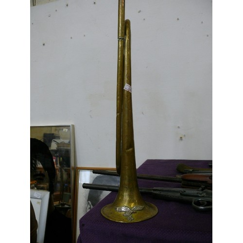 134 - A GERMAN LUFTWAFFE BRASS BUGLE WITH EAGLE AND SWASTIKA BADGE