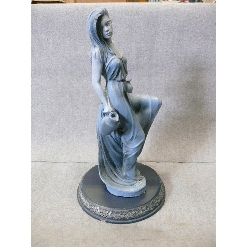 124A - A FIGURINE OF AQUARIUS FROM THE SIGNS OF THE ZODIAC BY CLARECRAFT