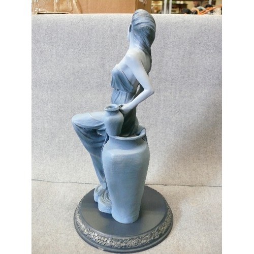 124A - A FIGURINE OF AQUARIUS FROM THE SIGNS OF THE ZODIAC BY CLARECRAFT