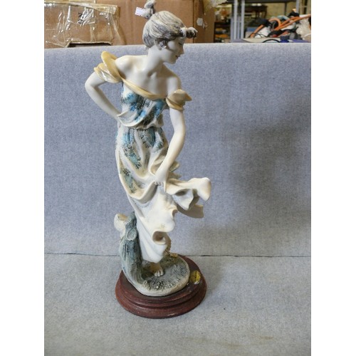 124B - A FIGURINE OF FLORENCE BY GIUSEPPE ARMANI (slight nibble to her bun)