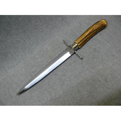 64 - AN INOX 247 STILETTO BLADE KNIFE WITH ANTLER HANDLE AND AND LEATHER SHEATH