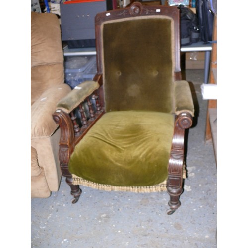 472 - HEAVILY CARVED OAK EDWARDIAN LIBRARY CHAIR, UPHOLSTERED IN OLIVE GREEN VELVET