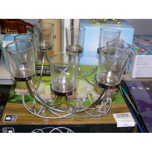 81 - A TEALIGHT HOLDER CENTRE PIECE WITH 8 GLASS TEALIGHT HOLDERS, NEW AND BOXED.