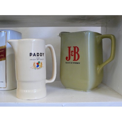 104 - 4 WHISKY ADVERTISING WATER JUGS FEATURING BLACK & WHITE, PADDY, J&B, AND JOHNNIE WALKER