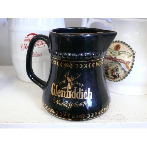 105 - 4 WHISKY ADVERTISING WATER JUGS FEATURING GLENFIDDICH, GLENGRANT, BOWMORE AND GLENFARCLAS