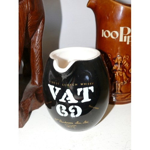 111 - 4 WHISKY ADVERTISING WATER JUGS FEATURING WHYTE & MCKAY, VAT 69, 100 PIPERS AND JOHNNIE WALKER