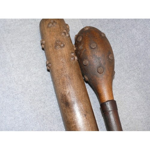 116 - TWO VINTAGE WOODEN TRENCH FIGHTING CLUBS