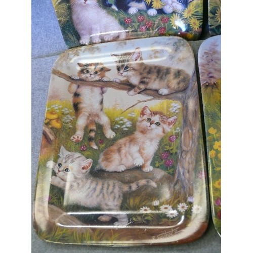 124 - A SET OF 4 CERAMIC GERMAN PLATES FEATURING KITTENS BY BRADEX