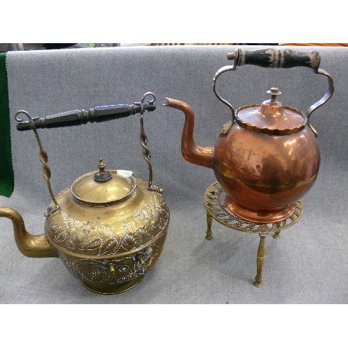 132 - A VERY NICE ORNATE BRASS KETTLE WITH BRASS TRIVET PLUS A COPPER KETTLE