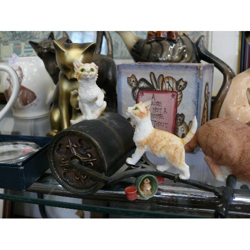 150 - A LARGE COLLECTION OF DECORATIVE CERAMIC CAT ORNAMENTS