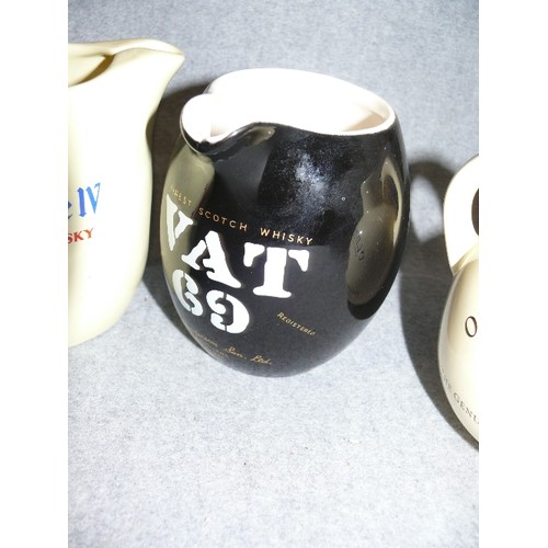 174 - 4 WHISKY ADVERTISING WATER JUGS FEATURING THE GREAT MACAULAY, OLD PULTENEY, KING GEORGE IV AND VAT 6... 