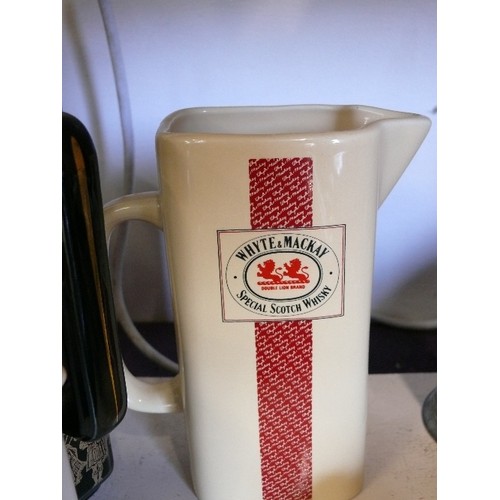 84 - 4 ADVERTISING WHISKY WATER JUGS FEATURING WHYTE & MACKAY, DEWAR'S, SEAGRAM'S ETC