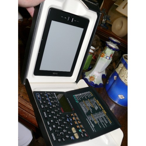 208 - A BOXED AMAZON KINDLE (NEW IN BOX) AND A SHARP ELECTRONIC ORGANISER