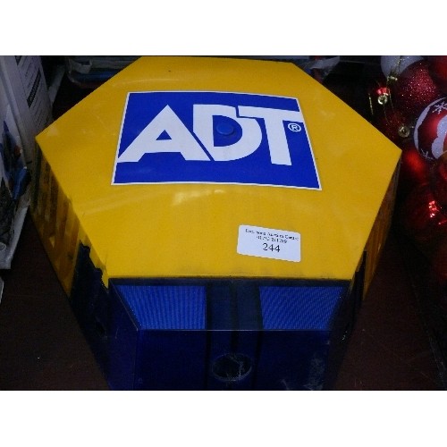 244 - A DUMMY HOUSE ALARM BY ADT, WORKING WHEN LOTTED