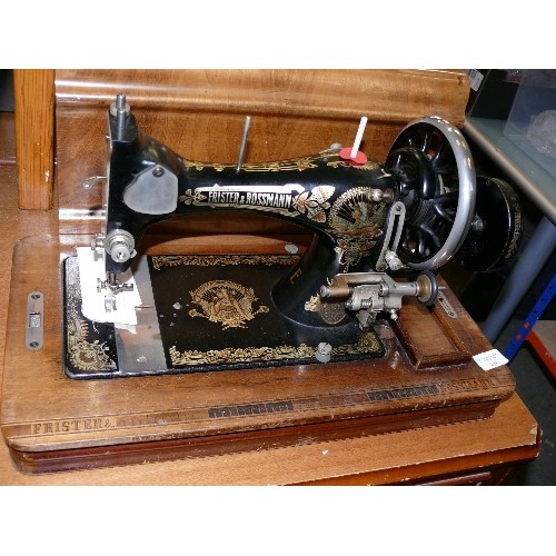 254 - A FRISTER ROSSMAN COFFIN TOPPED VINTAGE HAND CRANKED SEWING MACHINE