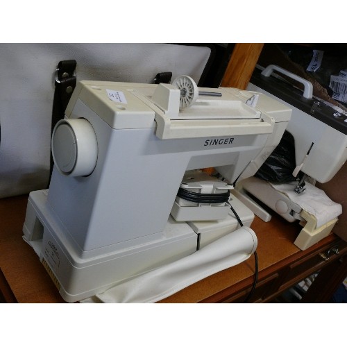 252 - SINGER ELECTRIC SEWING MACHINE WITH FOOT PEDAL AND SOFT CARRY CASE