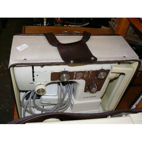 253 - A NEW HOME ELECTRIC SEWING MACHINE WITH FOOT PEDAL IN SOFT CARRY CASE