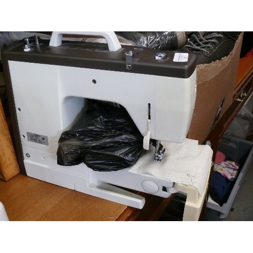 251 - A JONES ELECTRIC SEWING MACHINE WITH FOOT PEDAL AND SOFT CARRY CASE