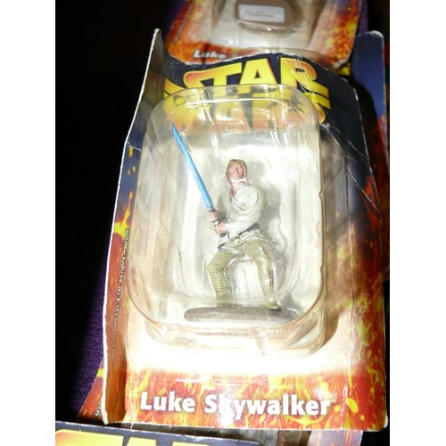 187A - 10 LUKE SKYWALKER FIGURES FROM THE 1990'S IN ORIGINAL PACKETS