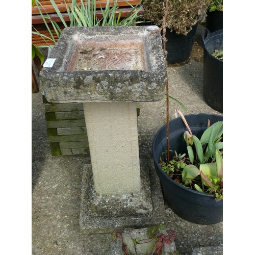 407 - A SQUARE CONCRETE BIRD BATH