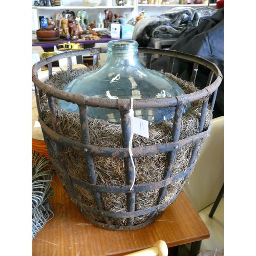 311 - LARGE CARBOY JAR IN PROTECTIVE CAGE