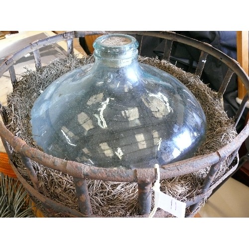 311 - LARGE CARBOY JAR IN PROTECTIVE CAGE