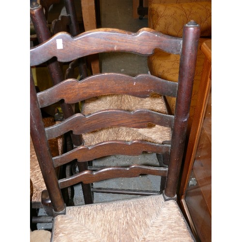 391 - 4 OAK LADDER BACK CHAIRS WITH RUSH SEATS