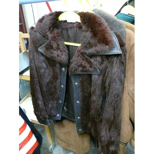 494 - A VINTAGE FUR AND LEATHER JACKET