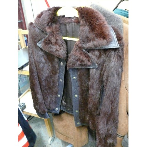 494 - A VINTAGE FUR AND LEATHER JACKET