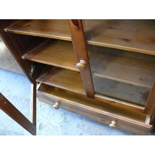 398 - PINE BOOKCASE WITH GLASS DOORS AND LOWER DRAWER