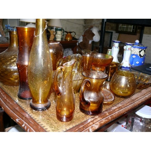 201 - A LARGE COLLECTION OF AMBER GLASSWARE TO INCLUDE VASES, JUGS AND DISHES