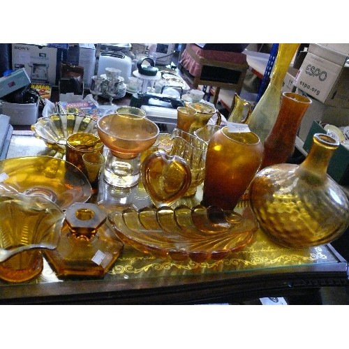 201 - A LARGE COLLECTION OF AMBER GLASSWARE TO INCLUDE VASES, JUGS AND DISHES