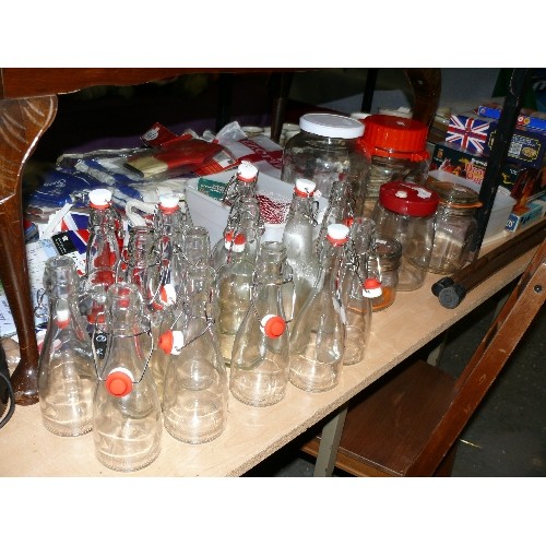 205 - A LARGE COLLECTION OF LIDDED GLASS STORAGE BOTTLES AND 5 VARIOUS LIDDED GLASS STORAGE JARS TO INCLUD... 