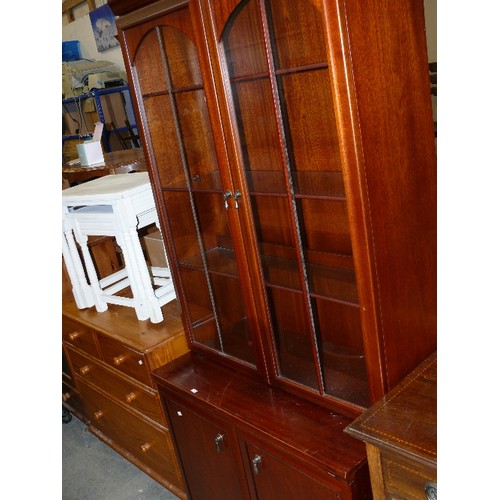 395 - DISPLAY CABINET IN CHERRY FINISH, GLASS DOORS TO THE TOP AND 2 CUPBOARDS BELOW