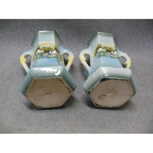 82 - A PAIR OF AUSTRIAN CHINA SWAN VASES