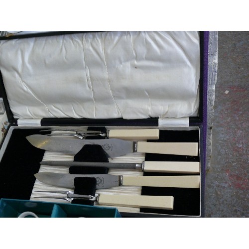 102 - A VINTAGE BOXED CARVING SET