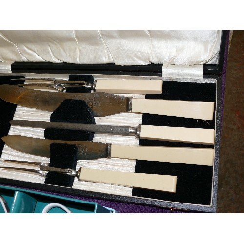 102 - A VINTAGE BOXED CARVING SET