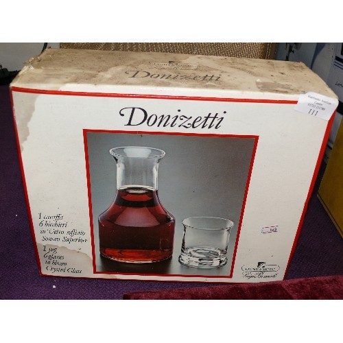 111 - A BLOWN CRYSTAL CARAFE AND MATCHING SET OF 6 GLASSES AS NEW IN ORIGINAL BOX