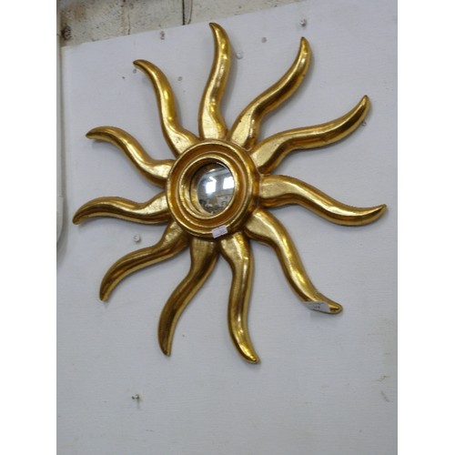 124 - A GOLD COLOURED SUN WITH MIRROR CENTRE