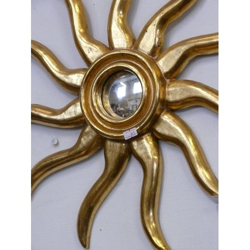 124 - A GOLD COLOURED SUN WITH MIRROR CENTRE