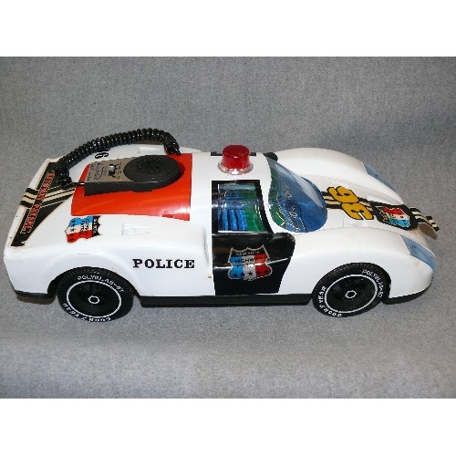 141 - A VINTAGE BATTERY OPERATED PORSCHE POLICE CAR WITH MICROPHONE IN ORIGINAL BOX