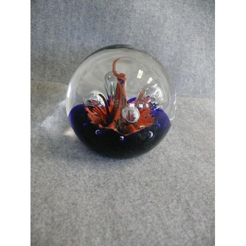 235 - A DECORATIVE GLASS PAPERWEIGHT