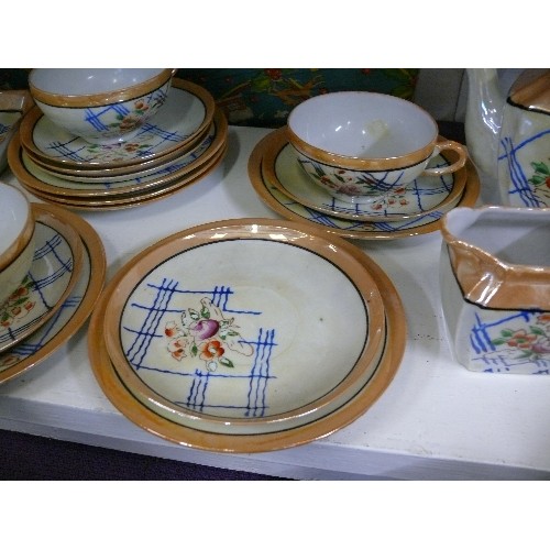 98 - A VINTAGE LUSTREWARE TEASET