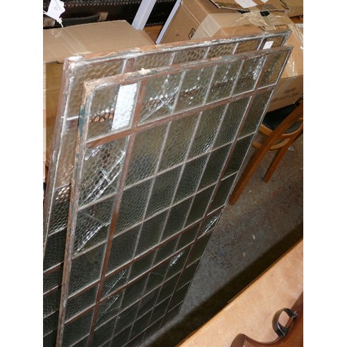 217 - 2 COPPER FRAMED GLASS PANELS 560M X 215MM