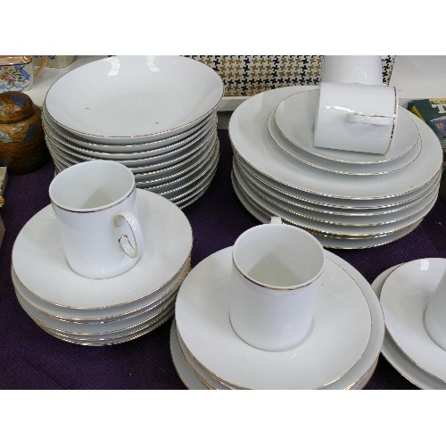 101 - A LARGE SELECTION OF WHITE AND GOLD RIMMED CHINA